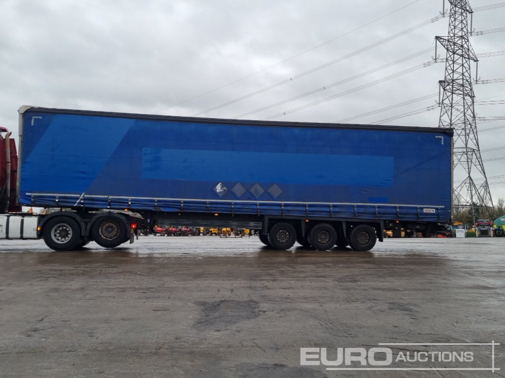 Schmitz Tri Axle Curtainsider Trailer - Semi-trailer dengan terpal samping: gambar 2 Schmitz Tri Axle Curtainsider Trailer - Semi-trailer dengan terpal samping: gambar 2