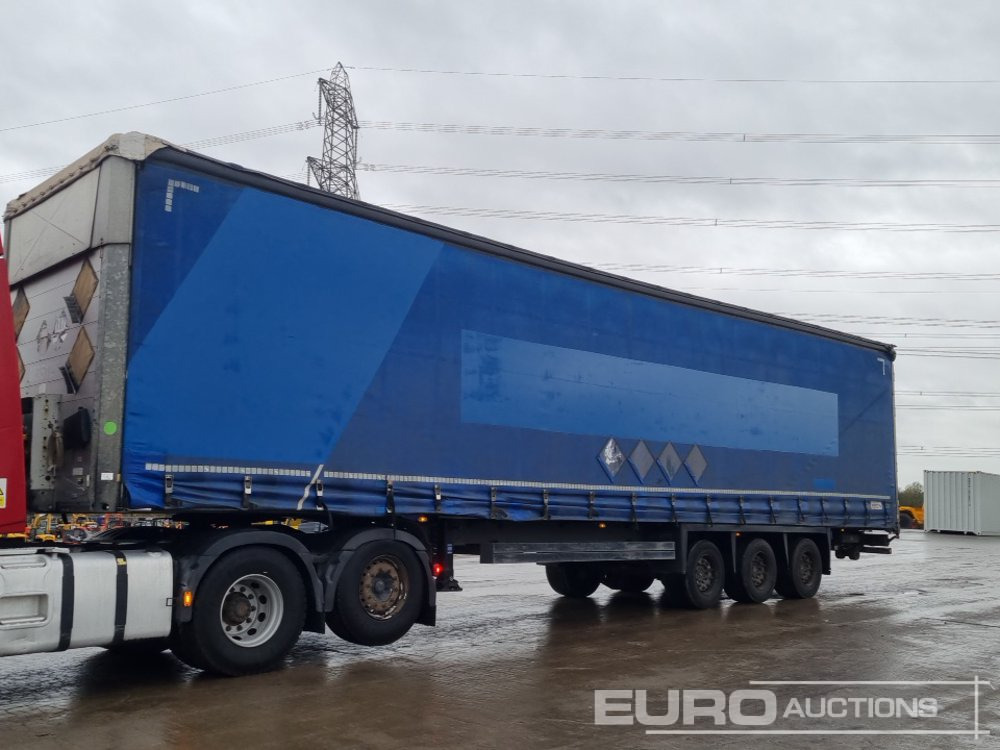 Schmitz Tri Axle Curtainsider Trailer - Semi-trailer dengan terpal samping: gambar 1 Schmitz Tri Axle Curtainsider Trailer - Semi-trailer dengan terpal samping: gambar 1