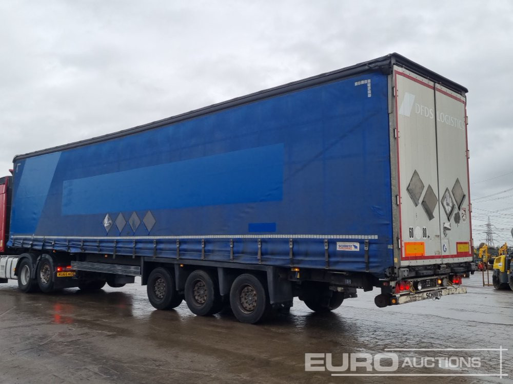 Schmitz Tri Axle Curtainsider Trailer - Semi-trailer dengan terpal samping: gambar 3 Schmitz Tri Axle Curtainsider Trailer - Semi-trailer dengan terpal samping: gambar 3
