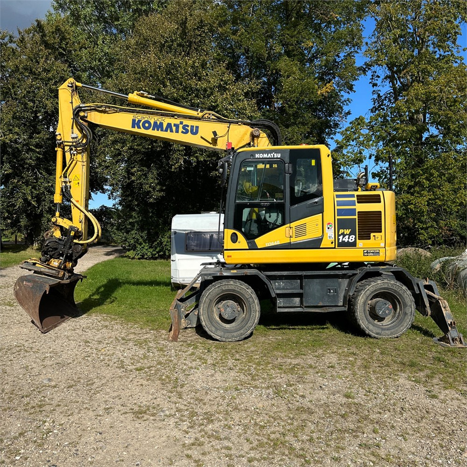 Komatsu PW148-11 - Ekskavator roda: gambar 1 Komatsu PW148-11 - Ekskavator roda: gambar 1