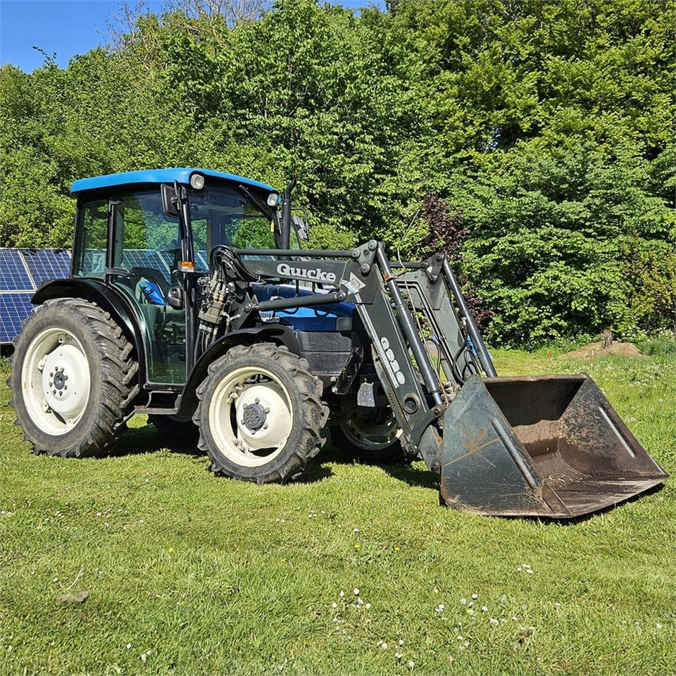 New Holland TN55D - Traktor: gambar 1 New Holland TN55D - Traktor: gambar 1