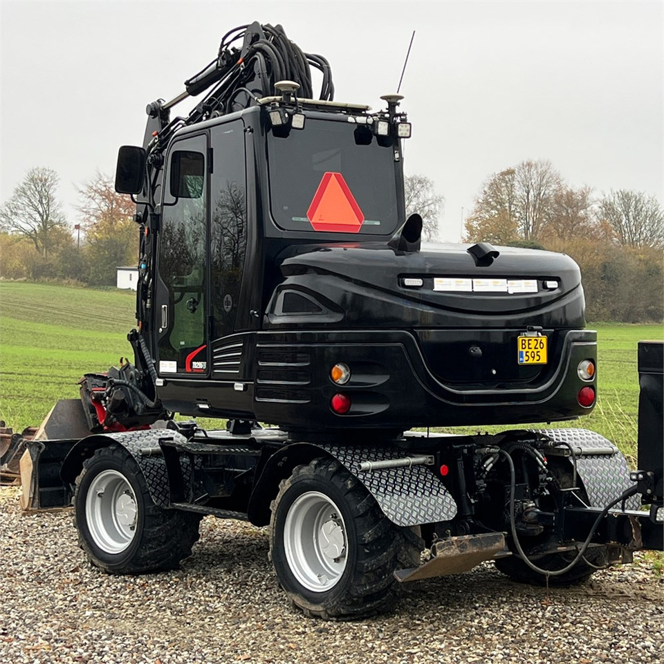 Takeuchi TB295 W - Ekskavator roda: gambar 5 Takeuchi TB295 W - Ekskavator roda: gambar 5