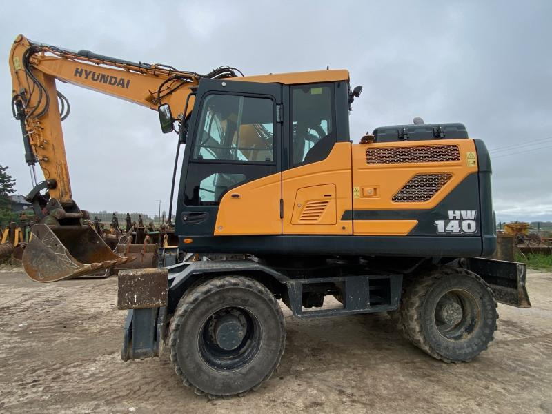 Hyundai HW 140 - Ekskavator roda: gambar 1 Hyundai HW 140 - Ekskavator roda: gambar 1
