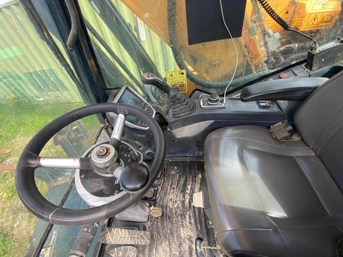 Hyundai HW 210 - Ekskavator roda: gambar 5 Hyundai HW 210 - Ekskavator roda: gambar 5
