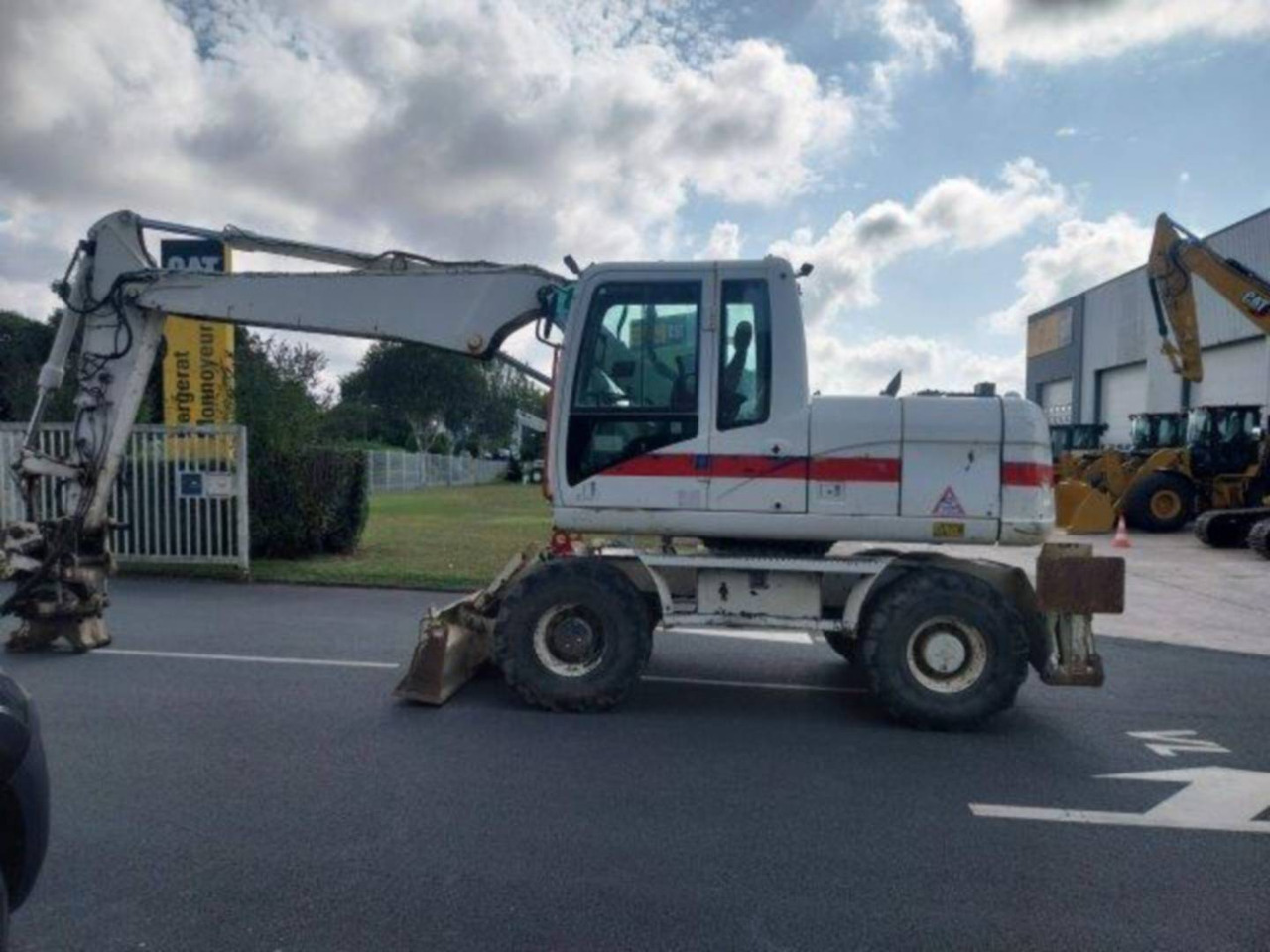 CAT M313D - Ekskavator roda: gambar 2 CAT M313D - Ekskavator roda: gambar 2