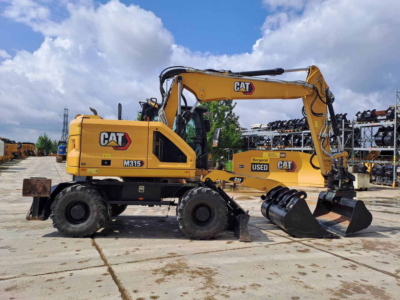 CAT M315 - Ekskavator roda: gambar 1 CAT M315 - Ekskavator roda: gambar 1