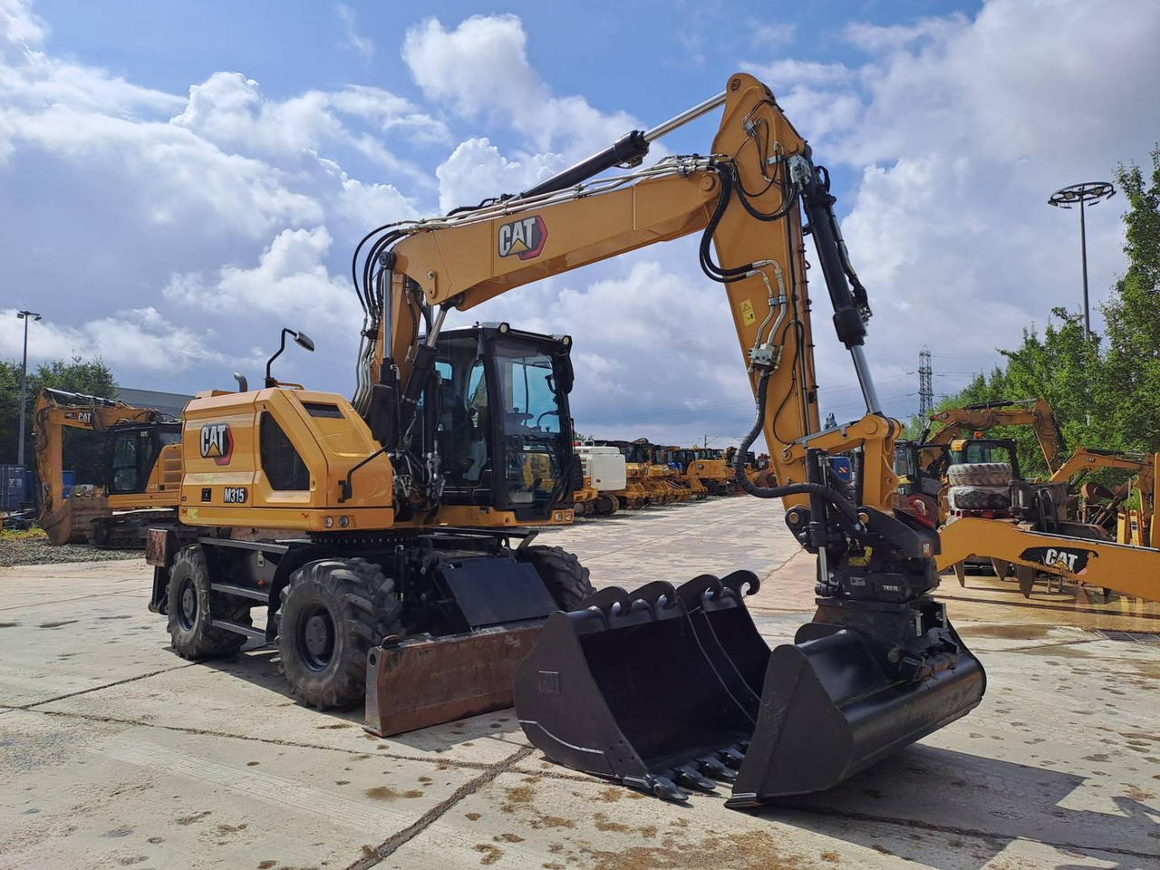 CAT M315 - Ekskavator roda: gambar 2 CAT M315 - Ekskavator roda: gambar 2