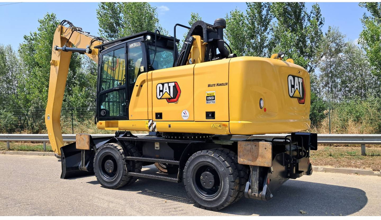 CAT MH3022-1 - Ekskavator roda: gambar 4 CAT MH3022-1 - Ekskavator roda: gambar 4