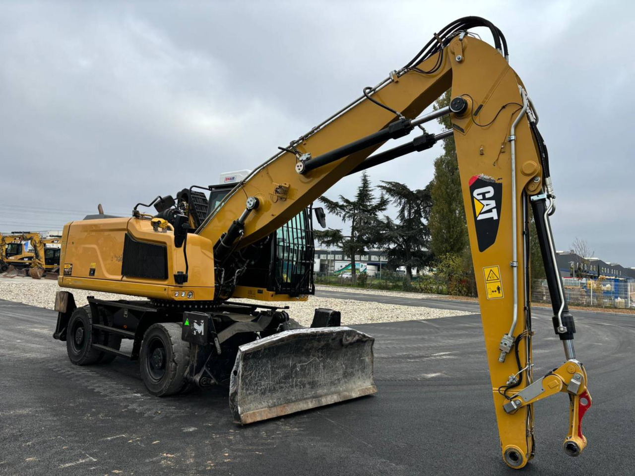 CAT MH3022-1 - Ekskavator roda: gambar 1 CAT MH3022-1 - Ekskavator roda: gambar 1