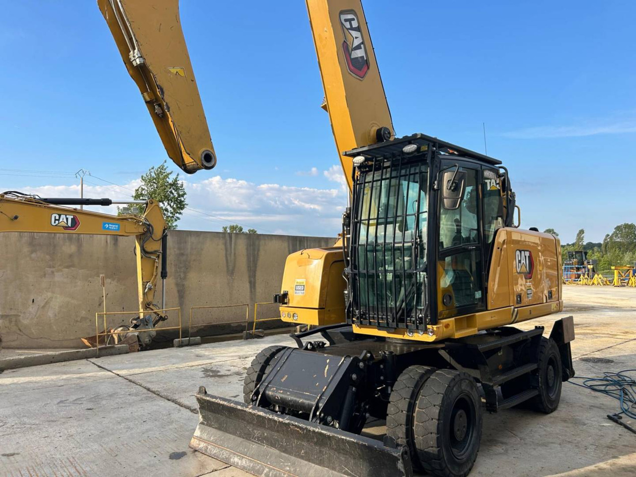 CAT MH3024-1 - Ekskavator roda: gambar 1 CAT MH3024-1 - Ekskavator roda: gambar 1