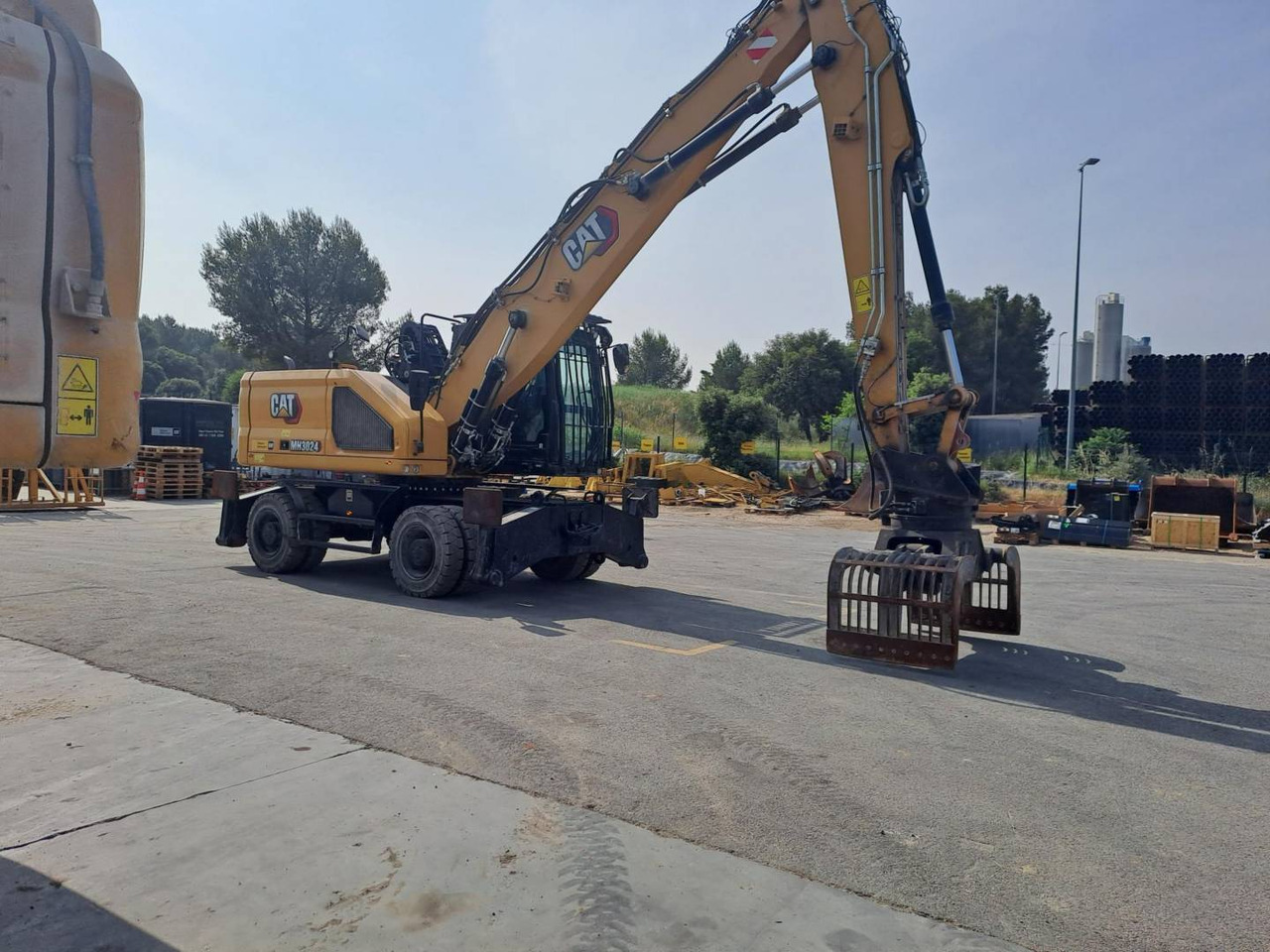 CAT MH3024 - Ekskavator roda: gambar 4 CAT MH3024 - Ekskavator roda: gambar 4