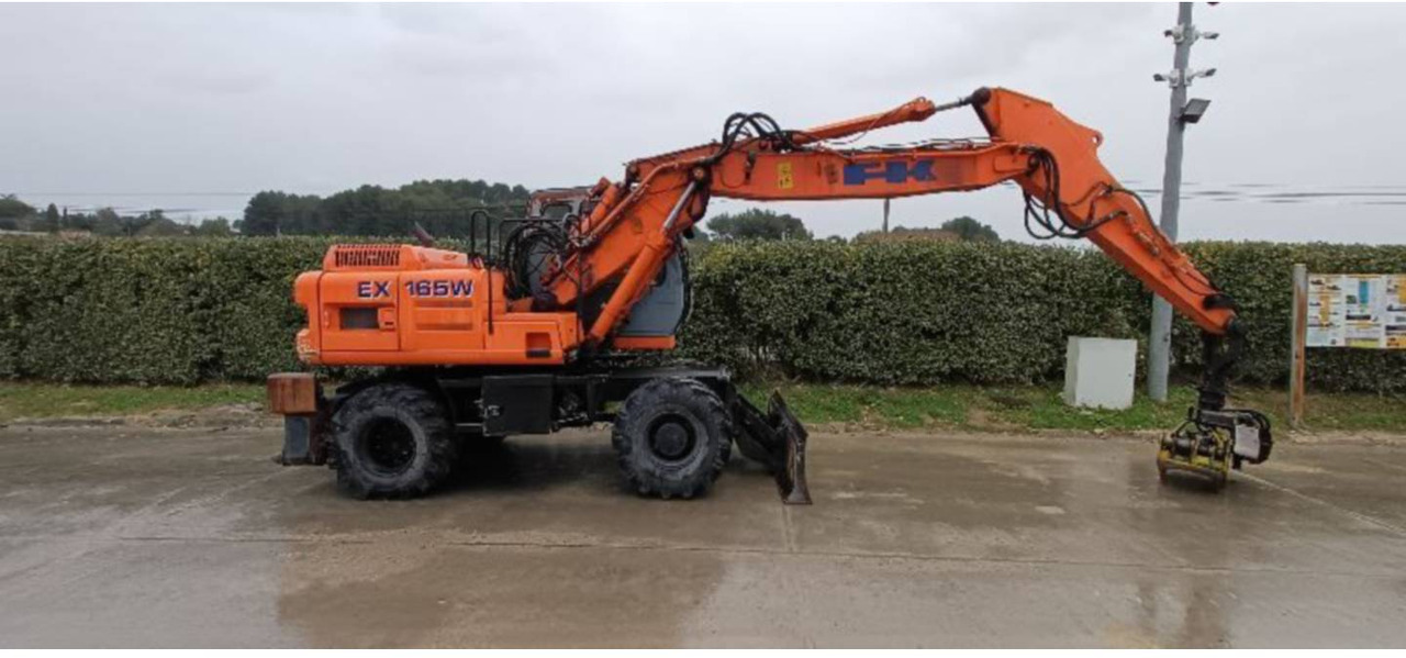 Ekskavator roda FIAT ALLIS / NEW HOLLAND EX165W: gambar 9 Ekskavator roda FIAT ALLIS / NEW HOLLAND EX165W: gambar 9