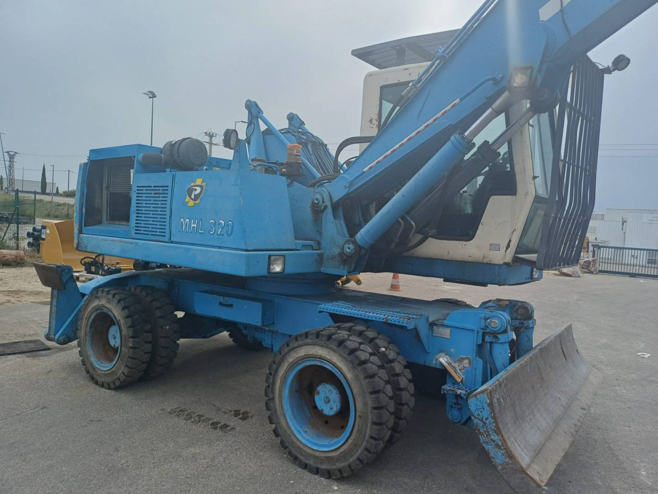 FUCHS MHL320 - Ekskavator roda: gambar 5 FUCHS MHL320 - Ekskavator roda: gambar 5