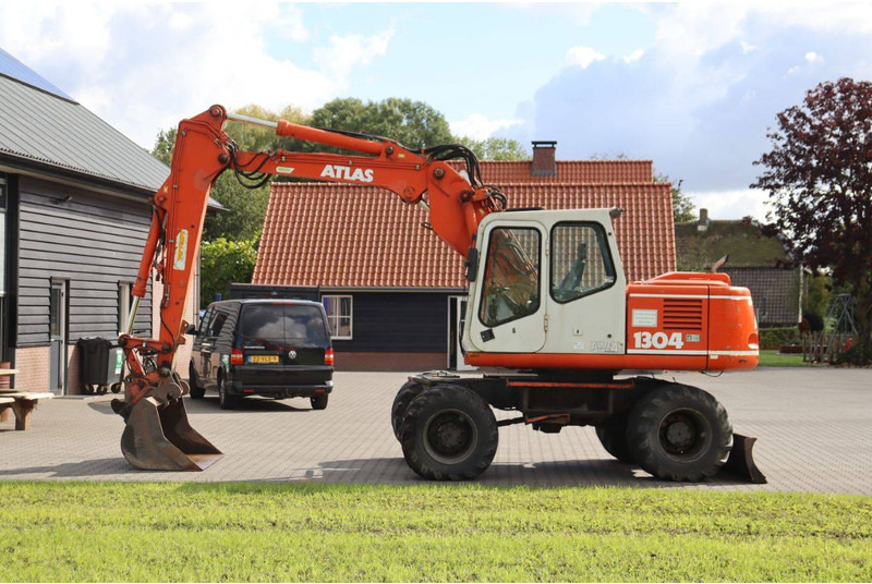 Atlas 1304 - Ekskavator roda: gambar 2 Atlas 1304 - Ekskavator roda: gambar 2