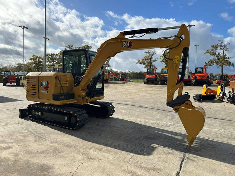 Caterpillar 305.5E2 - Ekskavator perayap: gambar 3 Caterpillar 305.5E2 - Ekskavator perayap: gambar 3