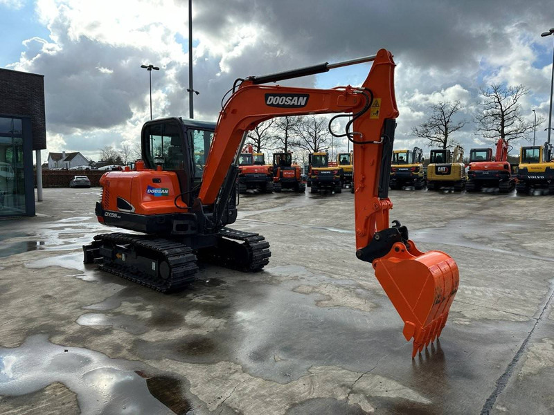 Doosan DX55-9C - Ekskavator perayap: gambar 3 Doosan DX55-9C - Ekskavator perayap: gambar 3