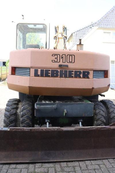 Liebherr A 310 - Ekskavator roda: gambar 5 Liebherr A 310 - Ekskavator roda: gambar 5