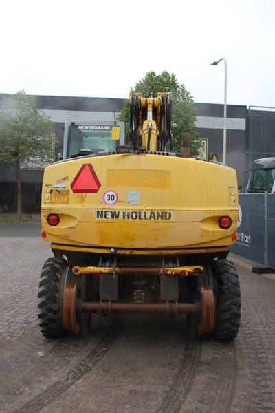New Holland MH5 Plus - Ekskavator roda: gambar 4 New Holland MH5 Plus - Ekskavator roda: gambar 4