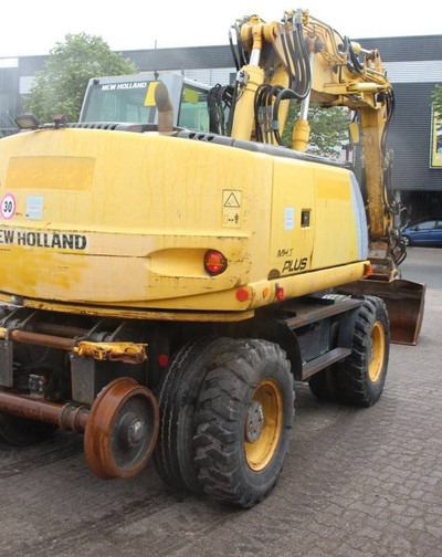 New Holland MH5 Plus - Ekskavator roda: gambar 5 New Holland MH5 Plus - Ekskavator roda: gambar 5