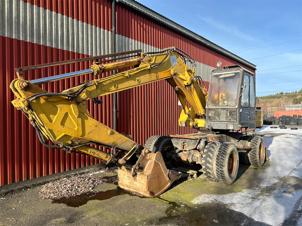 John Deere JD44 - Ekskavator roda: gambar 1 John Deere JD44 - Ekskavator roda: gambar 1