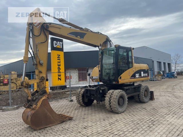 Cat M316C - Ekskavator roda: gambar 1 Cat M316C - Ekskavator roda: gambar 1
