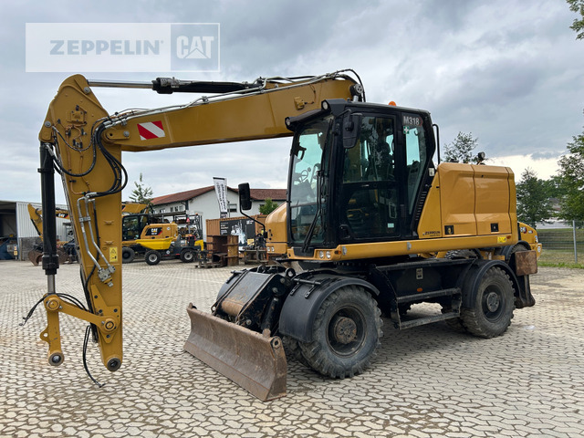 Cat M318-07A - Ekskavator roda: gambar 1 Cat M318-07A - Ekskavator roda: gambar 1