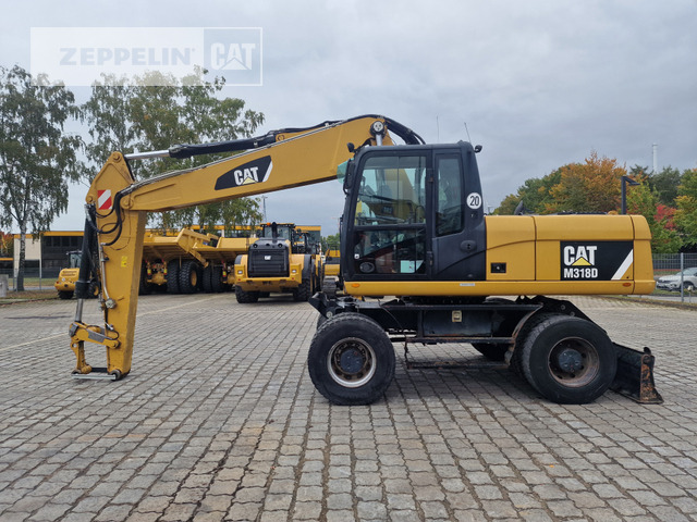 Cat M318D - Ekskavator roda: gambar 3 Cat M318D - Ekskavator roda: gambar 3