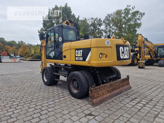 Cat M318D - Ekskavator roda: gambar 4 Cat M318D - Ekskavator roda: gambar 4