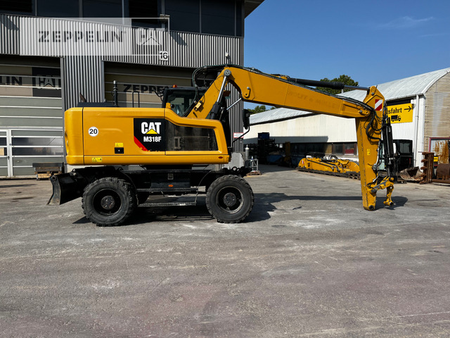 Cat M318F - Ekskavator roda: gambar 5 Cat M318F - Ekskavator roda: gambar 5