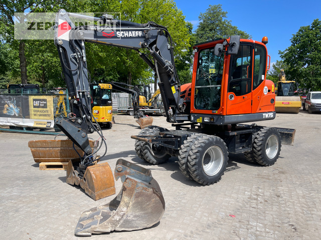 Schaeff TW75 - Ekskavator roda: gambar 1 Schaeff TW75 - Ekskavator roda: gambar 1